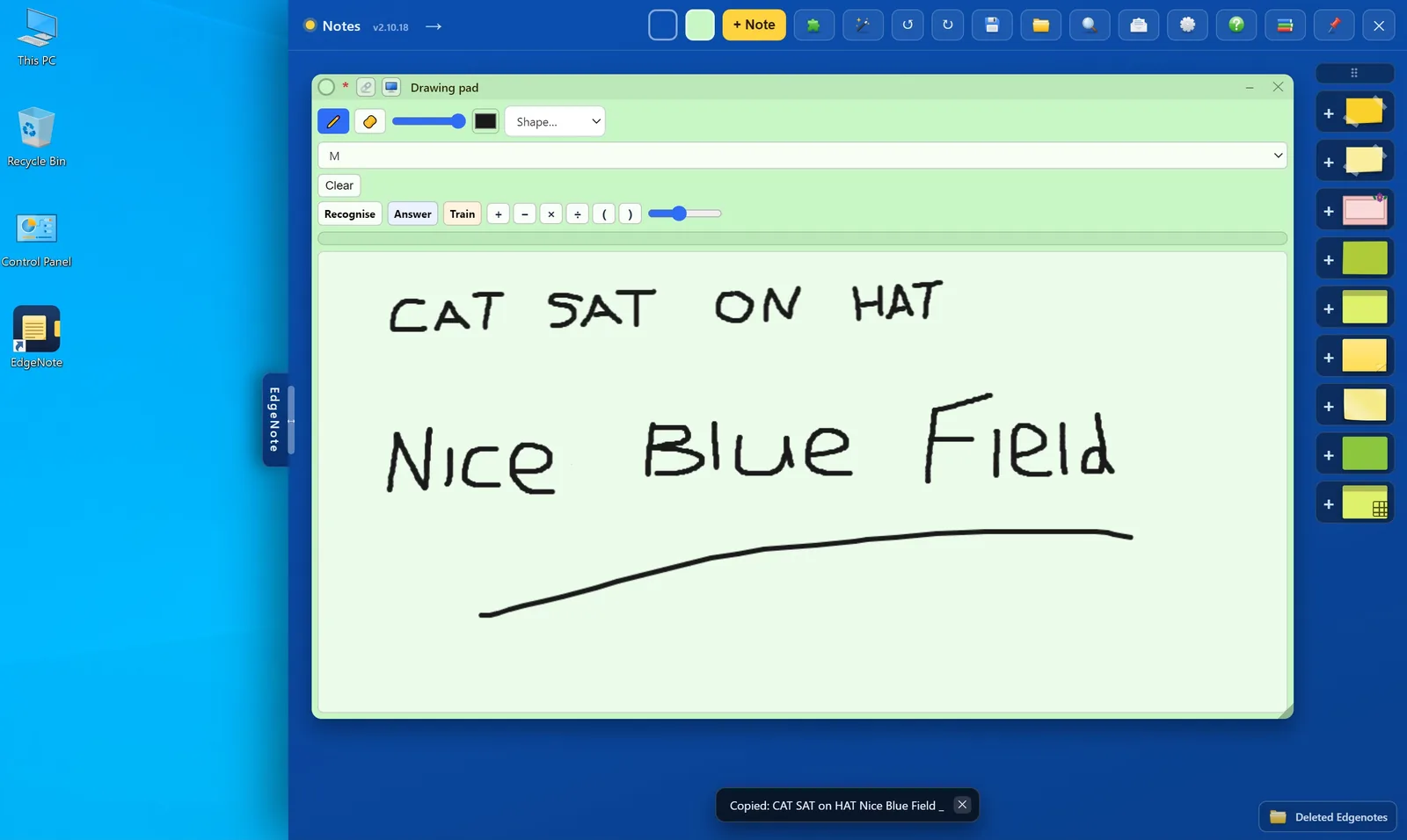 Handwritten words on the drawing pad, with a message showing they were copied as typed text